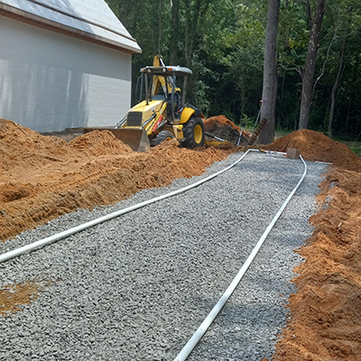 Drain field work at a job site